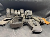 Pistol magazine holsters