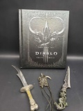 The Art of Diablo book. 2 Daggers and Necklace.