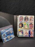 Book of mixed Sports cards and Dallas Cowboy Buttons