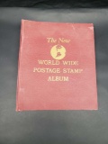 The New World Postage Stamp Album and Small book of stamps