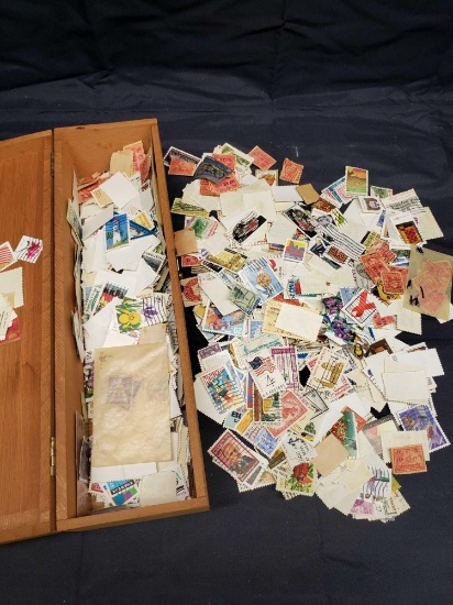 Large lot of Used Stamps. In wood box.