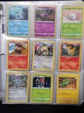 Binder Full of Pokemon Cards in Pages