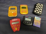 Vintage Handheld video games and Travel chess.