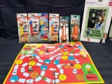 Pez Jungle mission survival kit dispensers. Cars pez. Wizard of oz mini tin sign and Foreign peanuts