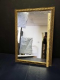 Lg gilded mirror.