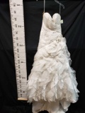 Maggie Sottero size 8 Off white Wedding gown. Ruffled gown with attached Train.