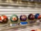 Five brand new undrilled bowling balls