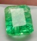 Emerald massive 8.25ct glowing green with gem id card