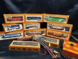 Tyco Precision Engineered HO Locomotives 10 trains. A couple boxes of track and Power supply.
