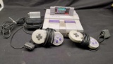 Super Nintendo with 2 controls PGA Tour golf game