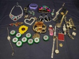 Lot of unusual watches and Heineken light up pins.