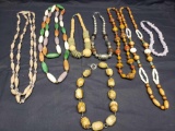 Unique lot of Necklaces with Polished rocks, Beads, Shells, and more.