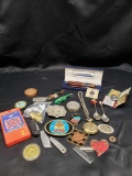 Mixed lot Aldo Domani pens. Belt buckles. Small pocket knives. Magnets and more.