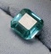 Sapphire huge glowing green gemstone with gem id card 7.55 ct