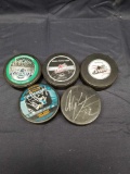 Signed Hockey Pucks 5 Units