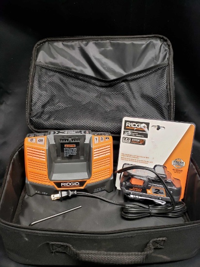 Ridgid 9.6 18v Charger and new Battery in carrying case.