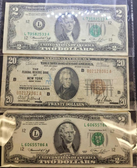 Federal Reserve Bank of NY 20 dollar bill and 2 dollar bills