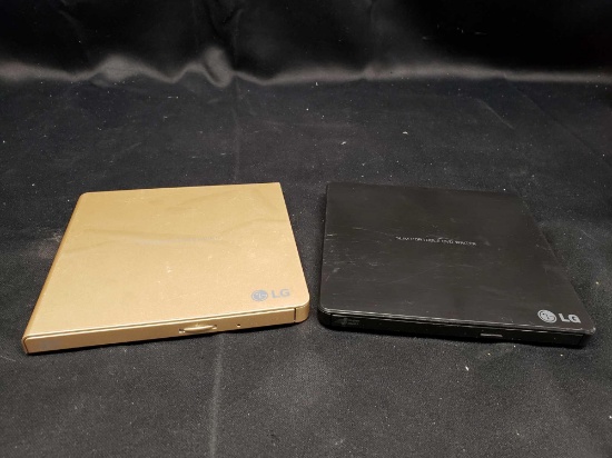 LG Slim Portable DVD Writers. Model GP65NG60. Model SP60NB50. Nontested. No cords