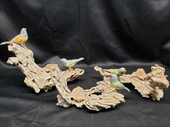 Wax covered birds with nests