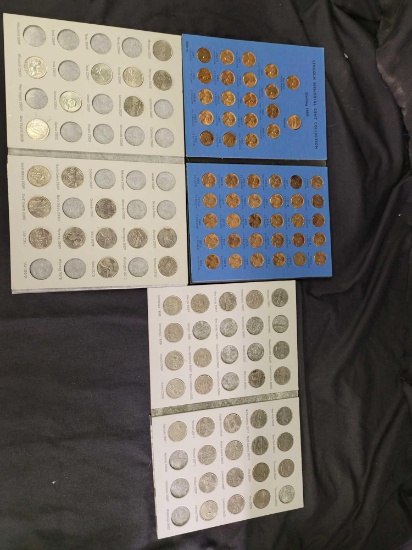 Coin books with coins penny's and Quarters