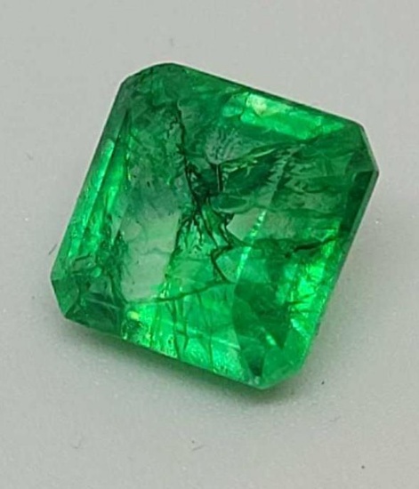 6.56ct Emerald glowing green color with gem ID card