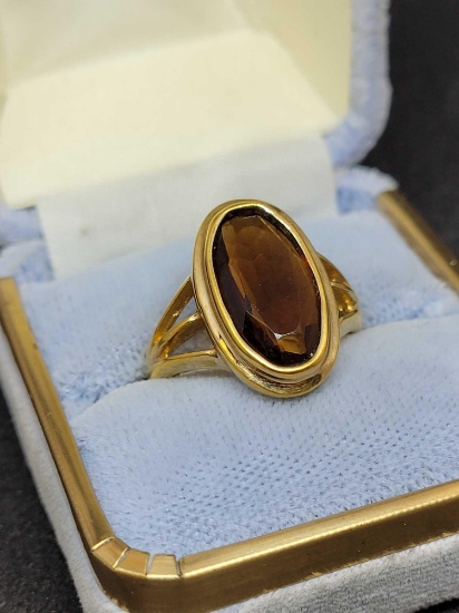 18kt gold ring by Avon plated with large red gemstone