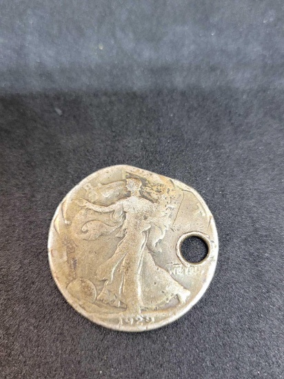 1929 Standing liberty half with hole in it