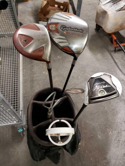 Cobra golf bag with Taylor Made Burner drivers. Ball retrievers