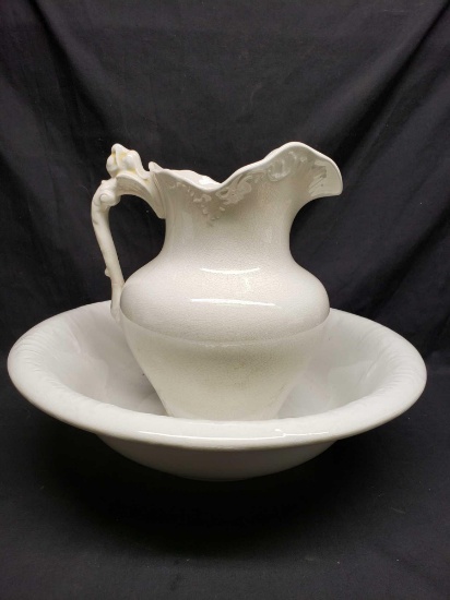 Over 100 year old Bowl and pitcher. In great shape for age. Has a cool cracked look.