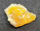 6.2ct Australian welo opal uncut rough orangy rainbow beauty