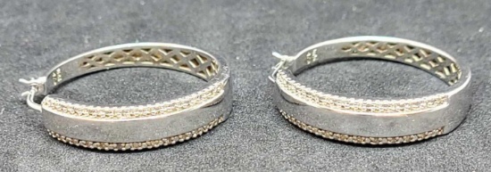 Diamond hoop earrings genuine stones set in 925 sterling silver .50CT like new