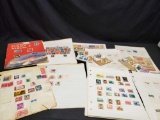 The Adventurer Stamp Album and pages of stamps.