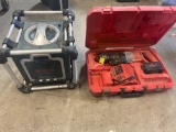 Bosch battery bay with Milwaukee sawzall charger and battery