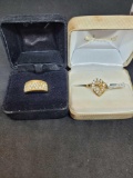 2 gold plated rings sizes 6 and 8 fancy