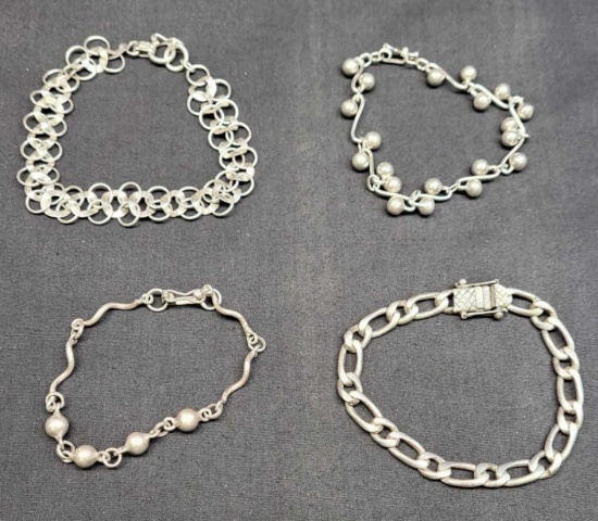 4 beautiful bracelets with 950 stamp