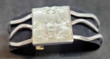 Silver bracelet with face and fish clear stone