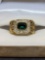 Stunning deco ring gold tone with green stone size 9