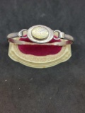 Sliver bracelet with opal stone