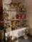 Shelf and contents urns angels gifts decor etc