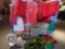 Christmas tablecloths Reds Green check and white. Wreaths buckets and fans