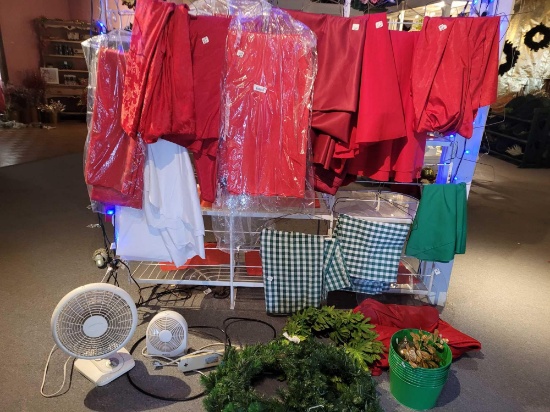 Christmas tablecloths Reds Green check and white. Wreaths buckets and fans