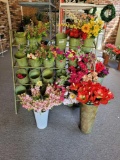 Green Wrought iron flower pot stand with flowers
