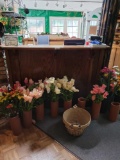 Oak sales counter w Cash registers packing supplies Lots of beautiful floral clay cylinders. Two lg