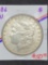 1886 Morgan silver dollar Au