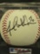 Signed baseball saying Jarrod washburn