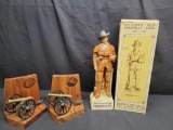 Mc Cormick distilling co. Calamity Jane Bourbon bottle. Book ends w Cannons