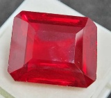 Blood red Ruby 28.50ct massive emerald cut stone firey color