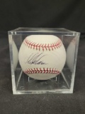 Signed baseball saying Garrot Anderson