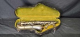 Antique saxophone with case