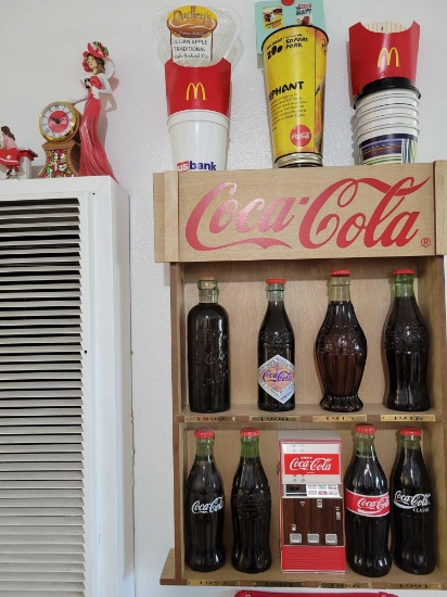 Vintage Coca Cola Bottles Display and Memorabilia